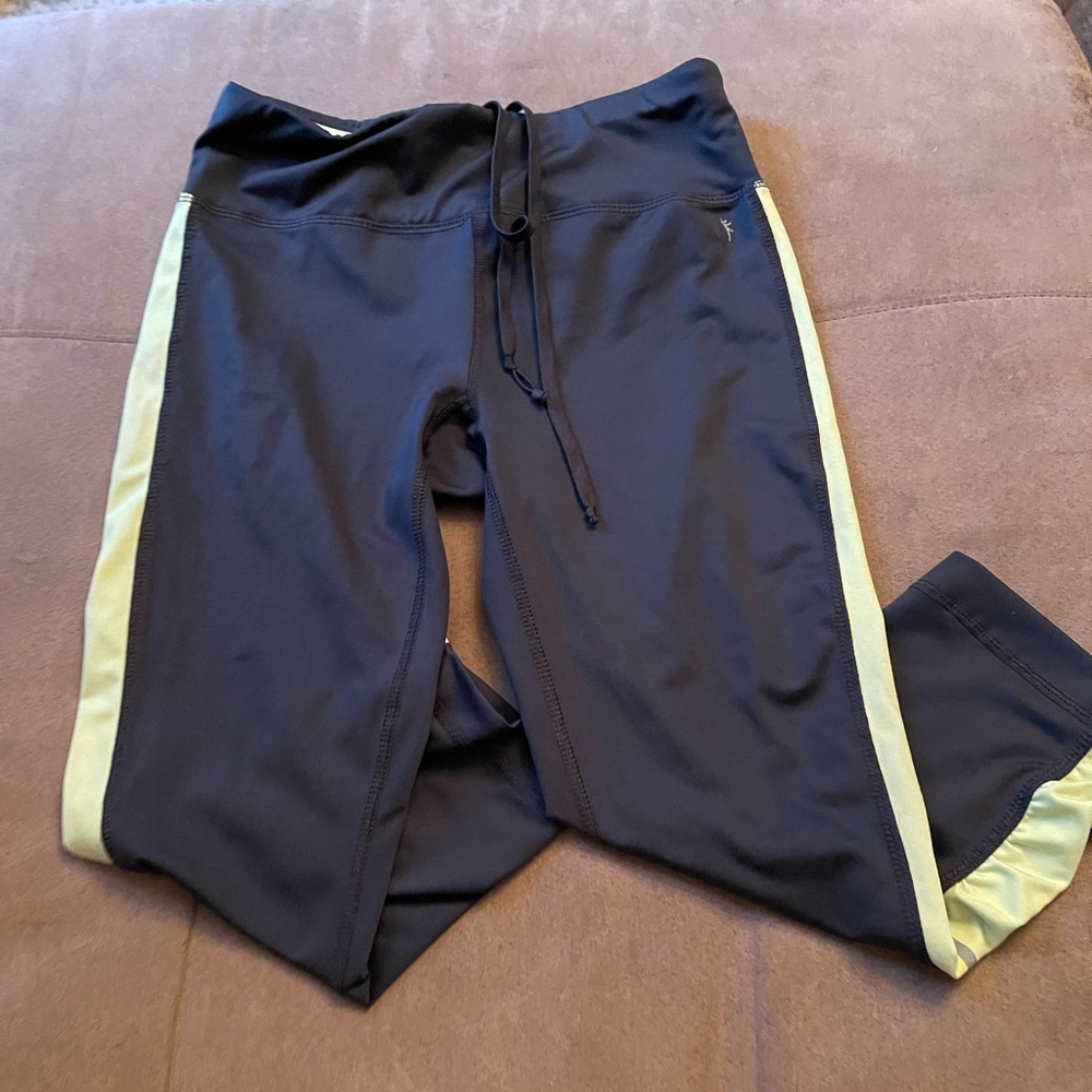 gray leggings with green stripe